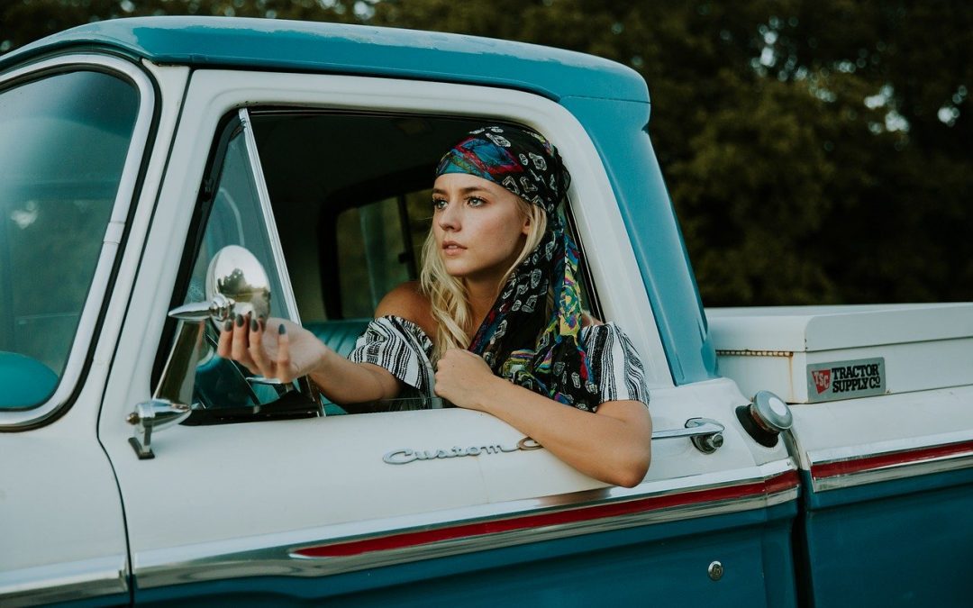 A young driver holding car keys